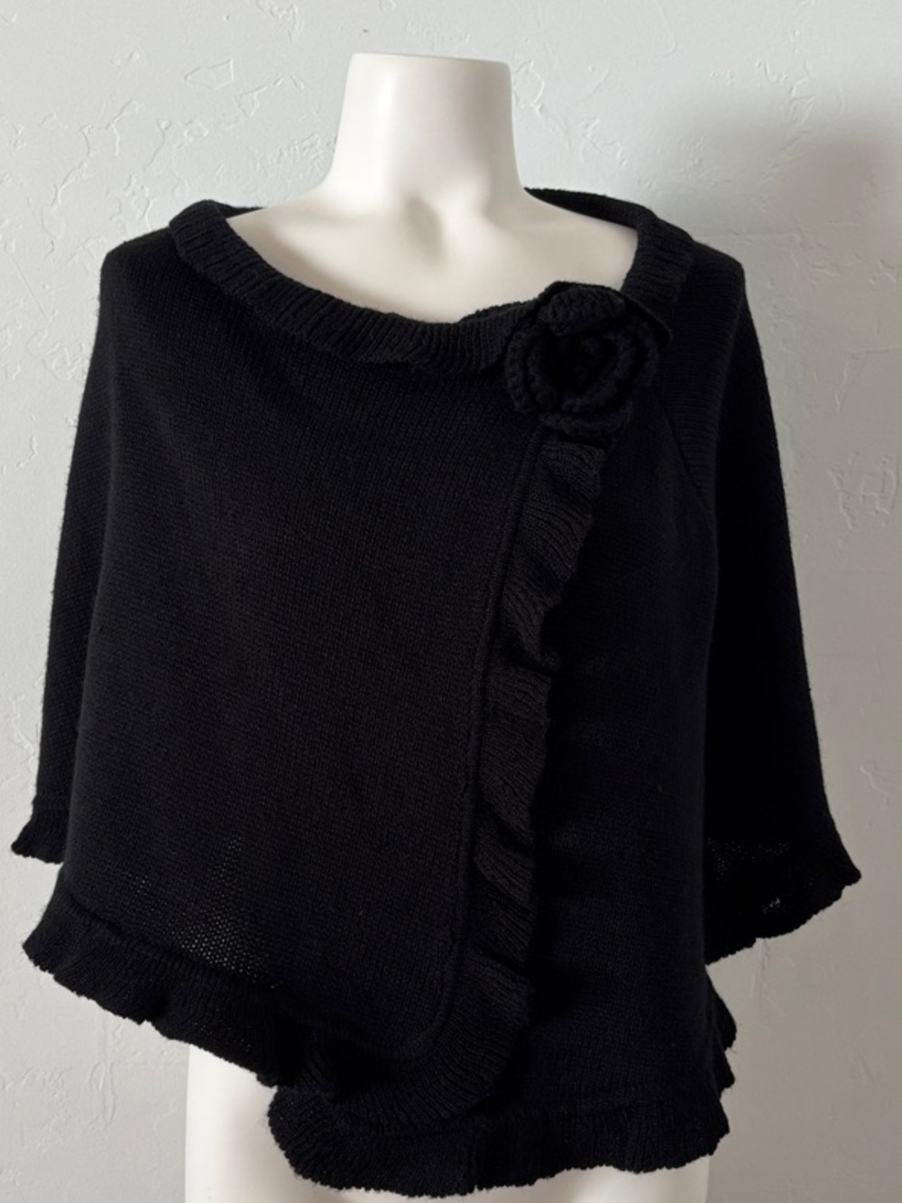ELEGANT! Black Caplet Ruffle Knit Poncho with Floral Accent